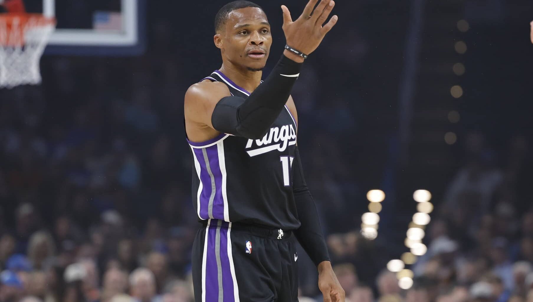 Oklahoma City, Oklahoma, USA; Sacramento Kings guard Russell Westbrook (18) gestures after scoring a three point basket against Oklahoma City Thunder during the first quarter at Paycom Center. Mandatory Credit: Alonzo Adams-Imagn Images