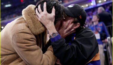 sean kaufman plants kiss on christopher briney at new york knicks game 035246791