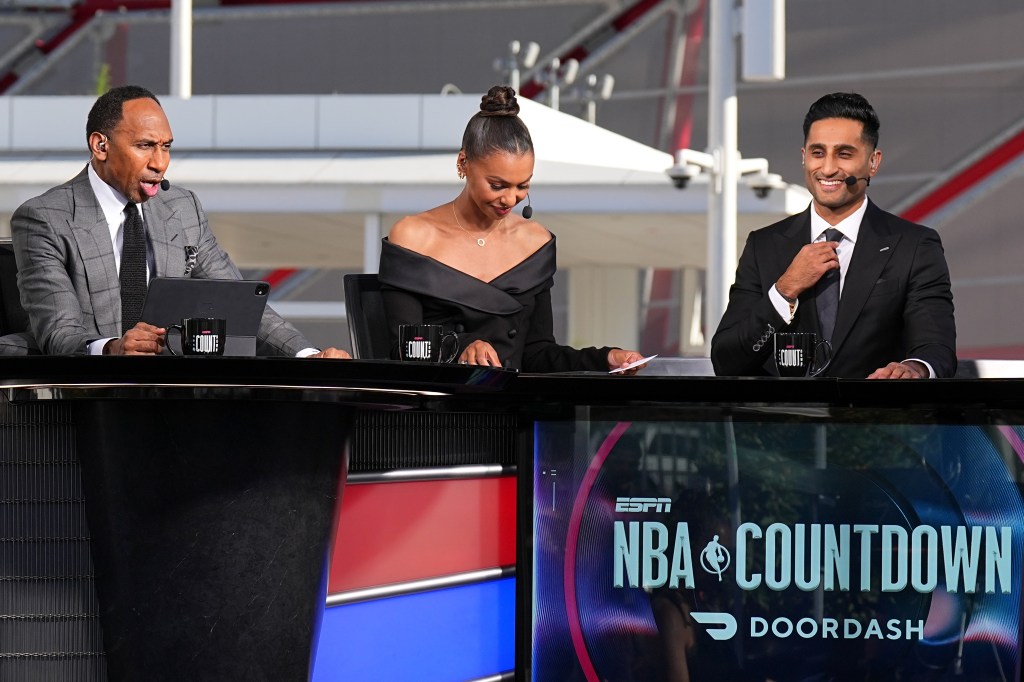 (L-R) Malika Andrews, Stephen A. Smith, and Shams Charania look on during the "NBA Countdown" pregame show before the game between the Phoenix Suns and the LA Clippers on October 23, 2024 at Intuit Dome in Los Angeles, California.  