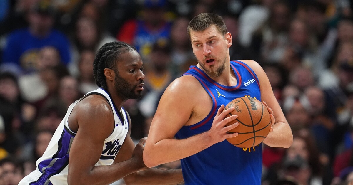 Kings beat Nuggets 128-123 to end 8-game slide on Saturday night