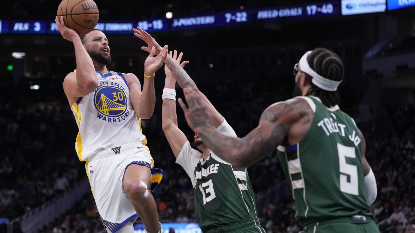 Rollins helps Bucks beat Warriors 120-110 without Antetokounmpo