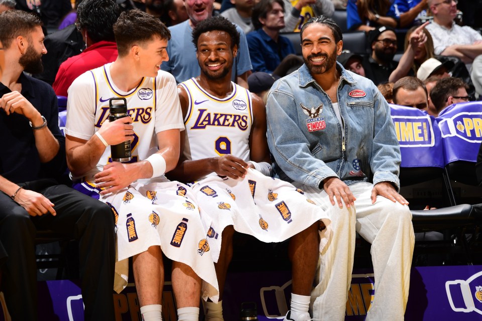 Bronny James smile during the game against the Miami Heat on November 2, 2025 at Crypto.Com Arena in Los Angeles, California. NOTE TO USER: User expressly acknowledges and agrees that, by downloading and/or using this Photograph, user is consenting to the terms and conditions of the Getty Images License Agreement. Mandatory Copyright Notice: Copyright 2025 NBAE (Photo by Adam Pantozzi/NBAE via Getty Images)