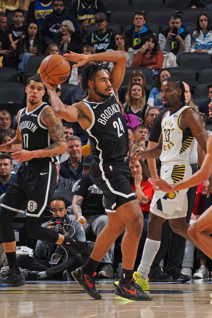 Cam Thomas of the Brooklyn Nets looks to pass the ball during the game against the Indiana Pacers.