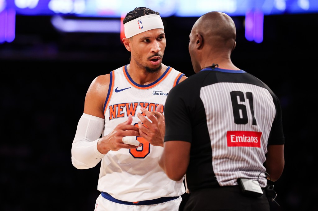 Josh Hart of the New York Knicks talks to referee Courtney Kirkland.