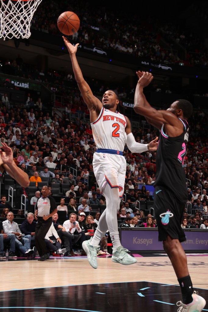 Miles McBride of the New York Knicks drives to the basket against the Miami Heat.