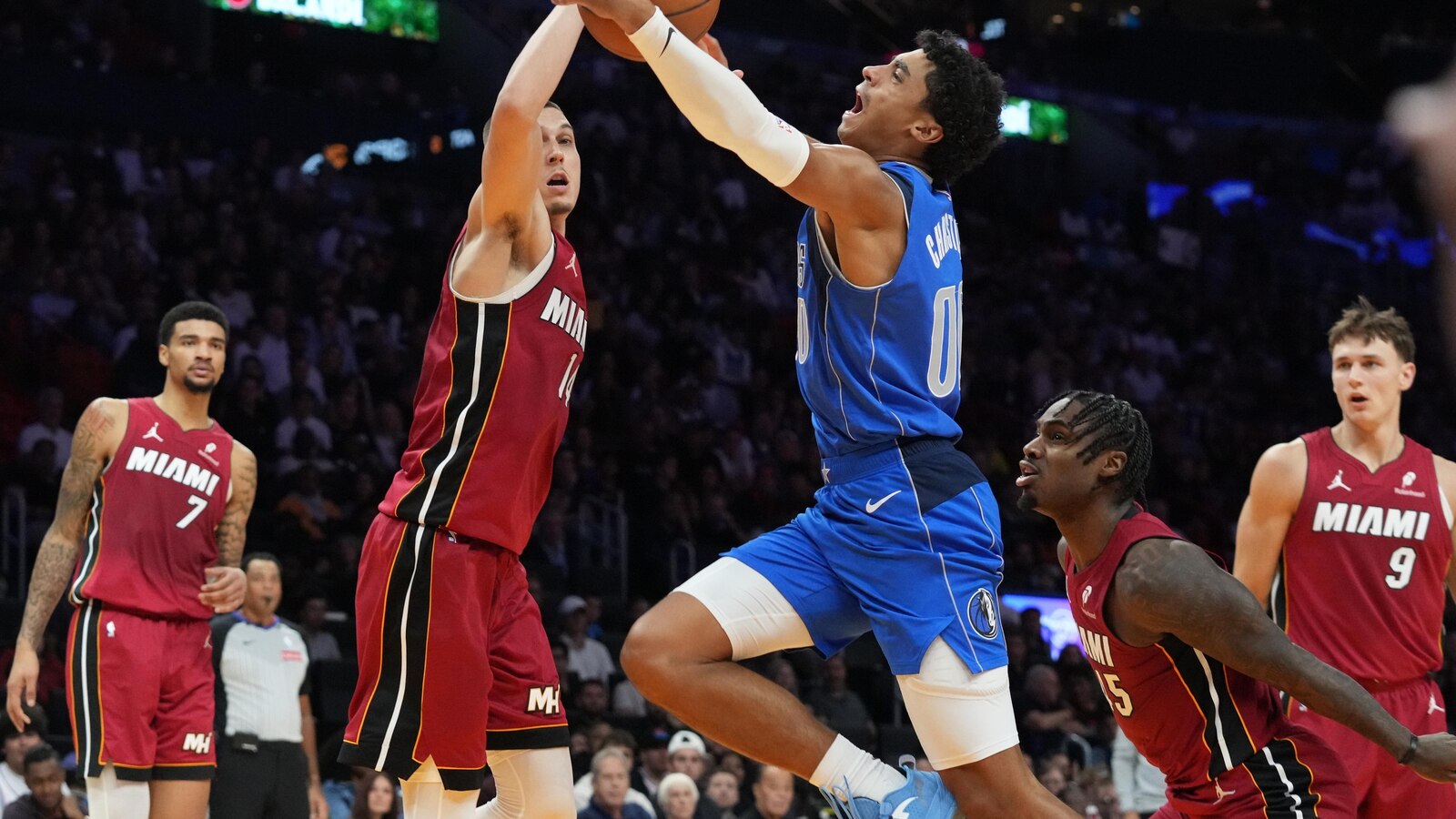 Tyler Herro scores 24 in season debut as Heat edge Mavericks 106-102