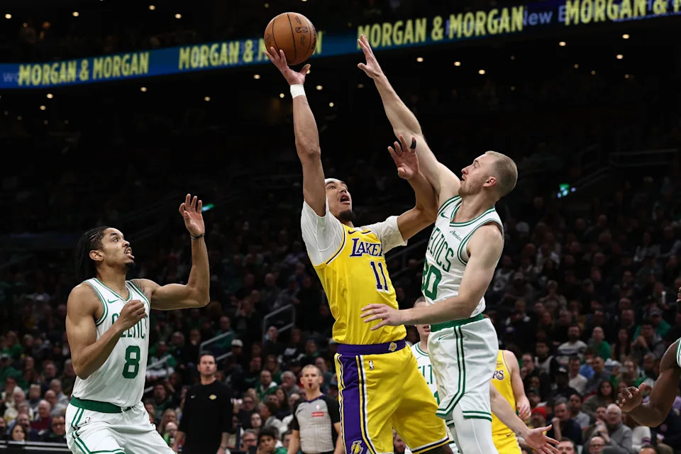 Dec 5, 2025; Boston, Massachusetts, USA; Los Angeles Lakers center Jaxson Hayes (11) shoots over Boston Celtics forward Sam Hauser (30) during the first half at TD Garden. Mandatory Credit: Winslow Townson-Imagn Images