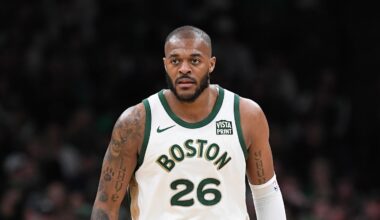 Apr 7, 2024; Boston, Massachusetts, USA; Boston Celtics forward Xavier Tillman Sr. (26) looks on during the second half against the Portland Trail Blazers at TD Garden. Mandatory Credit: Eric Canha-Imagn Images