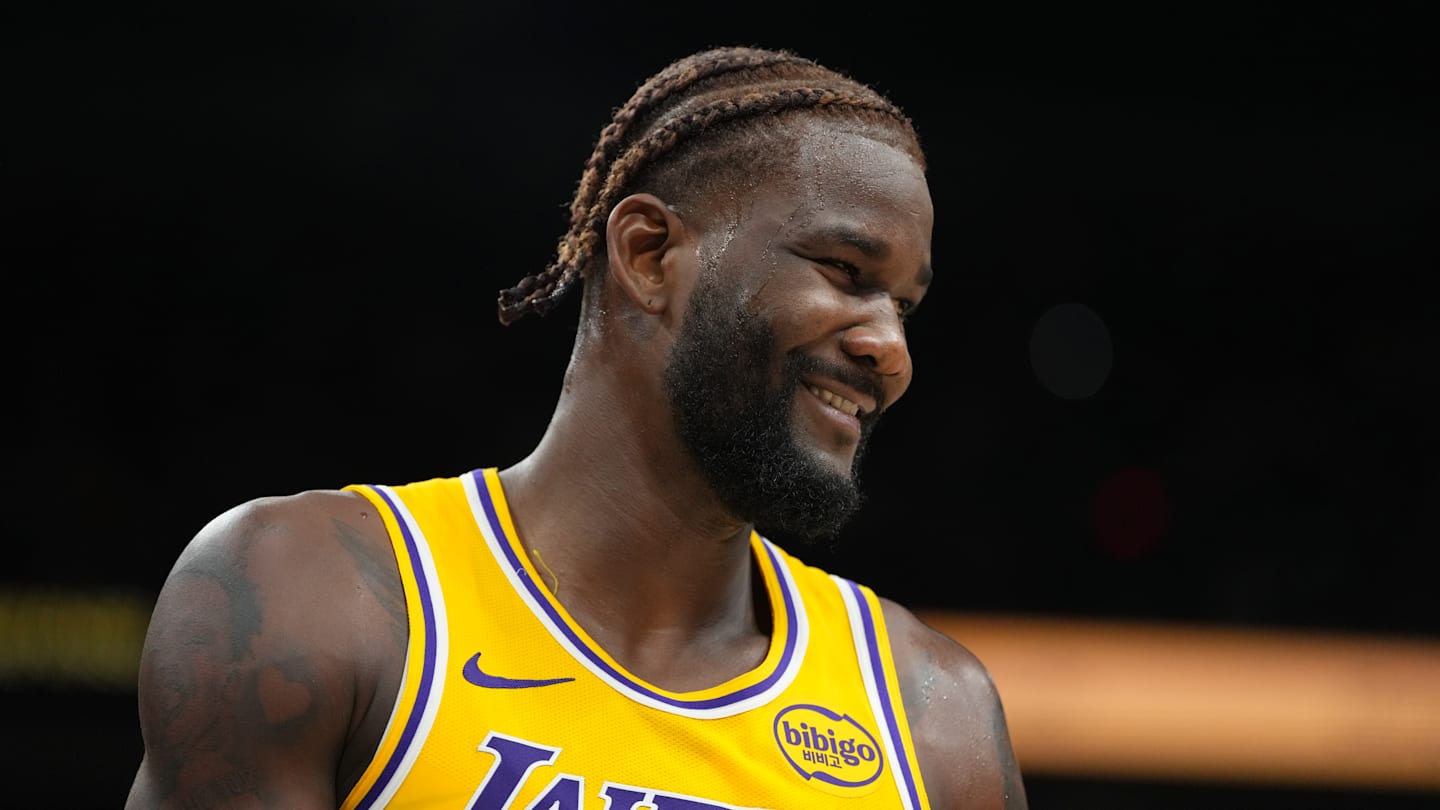 Nov 14, 2025; New Orleans, Louisiana, USA;  Los Angeles Lakers center Deandre Ayton (5) dribbles against New Orleans Pelicans guard Jeremiah Fears (0) during the first half at Smoothie King Center. Mandatory Credit: Stephen Lew-Imagn Images