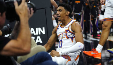 Suns forward Ryan Dunn (0) reacts after making a layup and drawing a foul on Clippers forward Brook Lopez (11) during a game at the Mortgage Matchup Center on Nov. 6, 2025.