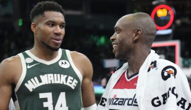 Oct 22, 2025; Milwaukee, Wisconsin, USA; Milwaukee Bucks forward Giannis Antetokounmpo (34) and Washington Wizards forward Khris Middleton (22) former teammates talk to each other after their game at Fiserv Forum. Mandatory Credit: Michael McLoone-Imagn Images