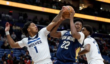 Dec 2, 2025; New Orleans, Louisiana, USA; Minnesota Timberwolves guard/forward Terrence Shannon Jr. (1) and forward Jaden McDaniels (3) defend against New Orleans Pelicans center Derik Queen (22) during the first half at Smoothie King Center. Mandatory Credit: Matthew Hinton-Imagn Images