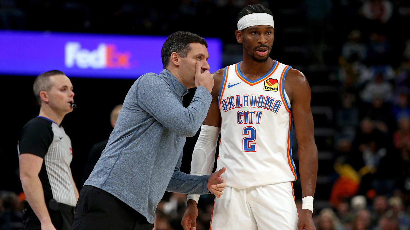Nov 9, 2025; Memphis, Tennessee, USA; Oklahoma City Thunder head coach Mark Daigneault talks with guard Shai Gilgeous-Alexander (2) during the third quarter against the Memphis Grizzlies at FedExForum. Mandatory Credit: Petre Thomas-Imagn Images