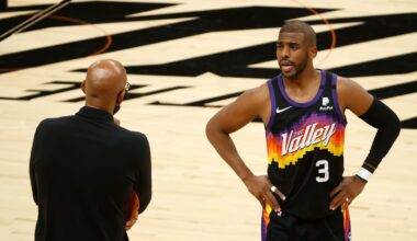 Former Phoenix Suns point guard Chris Paul speaks with head coach Monty Williams during Game 5 of the 2021 NBA Finals.