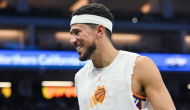 Nov 26, 2025; Sacramento, California, USA; Phoenix Suns guard Devin Booker (1) smiles on the sideline during the second quarter of the game against the Sacramento Kings at Golden 1 Center. Mandatory Credit: Ed Szczepanski-Imagn Images