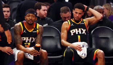 Apr 9, 2025; Phoenix, Arizona, USA; Phoenix Suns guard Bradley Beal (3) and guard Devin Booker (1) react on the bench against the Oklahoma City Thunder during the fourth quarter at Footprint Center. Mandatory Credit: Mark J. Rebilas-Imagn Images