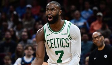 Nov 30, 2025; Cleveland, Ohio, USA; Boston Celtics guard Jaylen Brown (7) reacts after fouling Cleveland Cavaliers guard Donovan Mitchell (45) during the second half at Rocket Arena. Mandatory Credit: David Dermer-Imagn Images