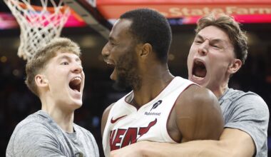 Miami Heat forward Andrew Wiggins reacts to winning the game with teammates against the Cleveland Cavaliers during overtime at Kaseya Center on November 10.