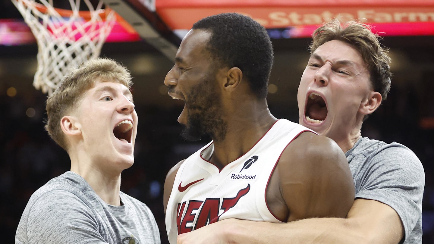 Miami Heat forward Andrew Wiggins reacts to winning the game with teammates against the Cleveland Cavaliers during overtime at Kaseya Center on November 10.