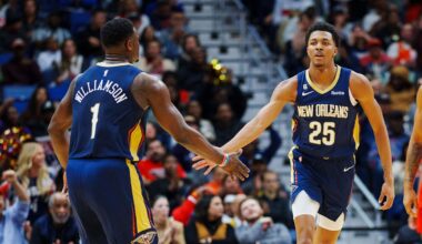 Nov 30, 2022; New Orleans, Louisiana, USA; New Orleans Pelicans guard Trey Murphy III (25) high fives forward Zion Williamson (1) after dunking the ball against the Toronto Raptors during the second quarter at Smoothie King Center. Mandatory Credit: Andrew Wevers-Imagn Images