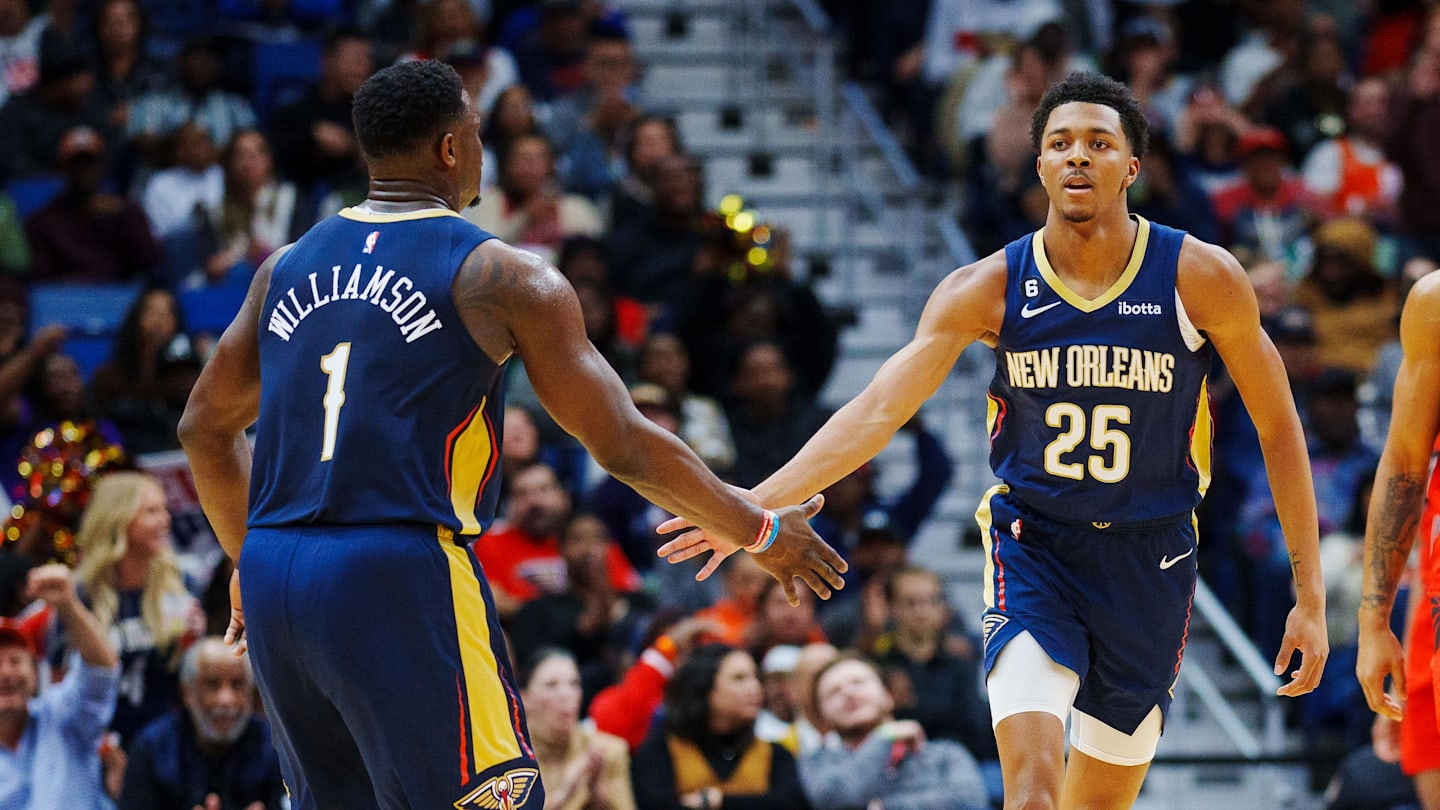 Nov 30, 2022; New Orleans, Louisiana, USA; New Orleans Pelicans guard Trey Murphy III (25) high fives forward Zion Williamson (1) after dunking the ball against the Toronto Raptors during the second quarter at Smoothie King Center. Mandatory Credit: Andrew Wevers-Imagn Images