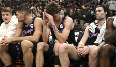 Dec 3, 2025; Chicago, Illinois, USA;  Chicago Bulls forward Matas Buzelis (14), center, and guard Josh Giddey (3) after the second half against the Brooklyn Nets at the United Center. Mandatory Credit: Matt Marton-Imagn Images