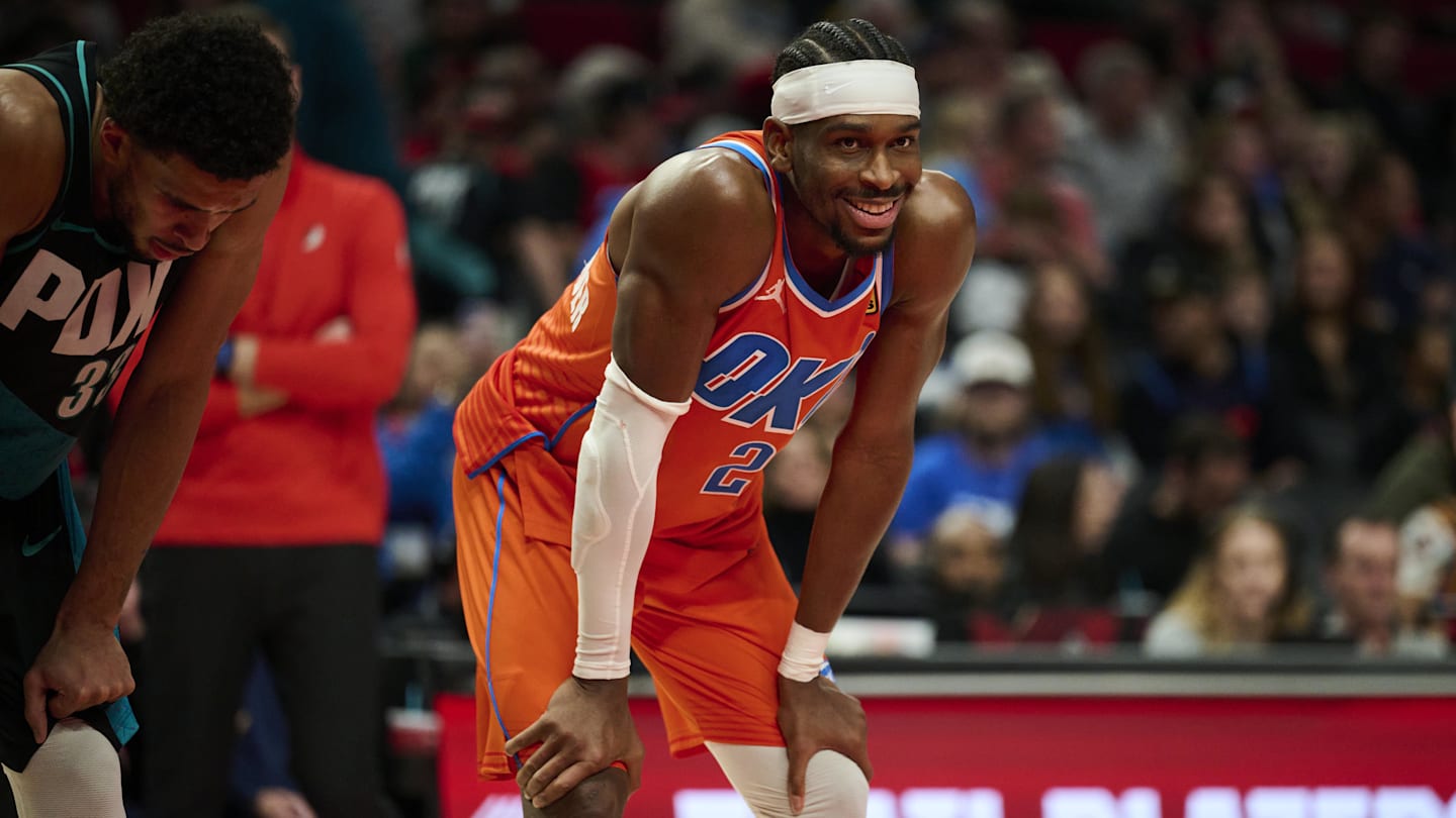 Nov 30, 2025; Portland, Oregon, USA; Oklahoma City Thunder guard Shai Gilgeous-Alexander (2) smiles at a fan during the second half in a game against the Portland Trail Blazers at Moda Center. Mandatory Credit: Troy Wayrynen-Imagn Images