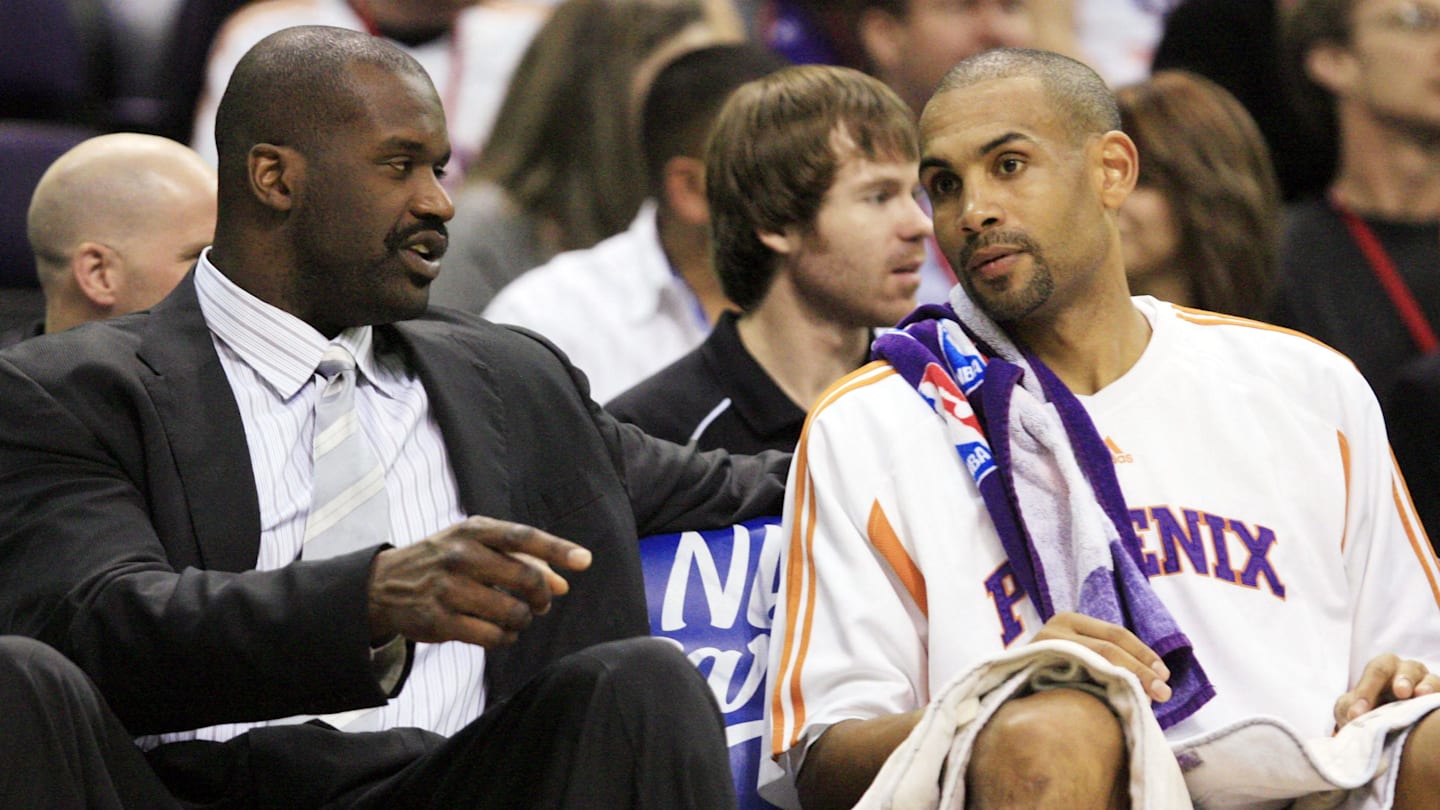 Phoenix Suns center Shaquille O'Neal talks to Grant Hill on the bench against the Dallas Mavericks during NBA action at US Airways Center in Phoenix, AZ. Mandatory Credit: Rob Schumacher/The Arizona Republic via USA TODAY NETWORK