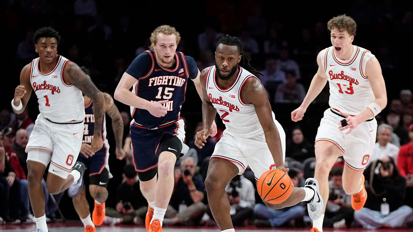Ohio State Buckeyes guard Bruce Thornton (2) brings the ball up court past Illinois Fighting Illini forward Jake Davis (15) during the first half of the NCAA men's basketball game in Columbus on Dec. 9, 2025. Ohio State lost 86-78.