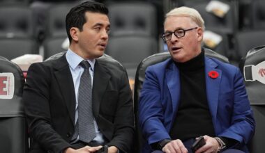 Nov 4, 2025; Toronto, Ontario, CAN; Toronto Raptors general manager Bobby Webster (left) and Maple Leaf Sports and Entertainment president and CEO Keith Pelley (right) talk during warm up before a game against the Milwaukee Bucks at Scotiabank Arena. Mandatory Credit: John E. Sokolowski-Imagn Images