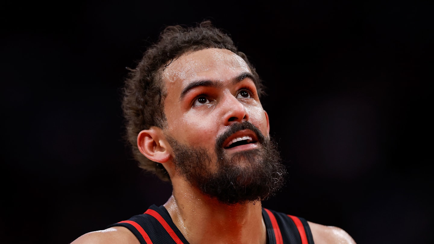 Trae Young looks up during a match against the Houston Rockets