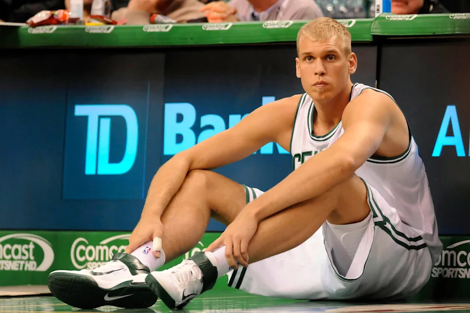 January 18, 2012; Boston, MA, USA; Boston Celtics center Greg Stiemsma (54) watches the action from the sidelines during the fourth quarter against the Toronto Raptors at TD Garden. Mandatory Credit: Bob DeChiara-USA TODAY Sports