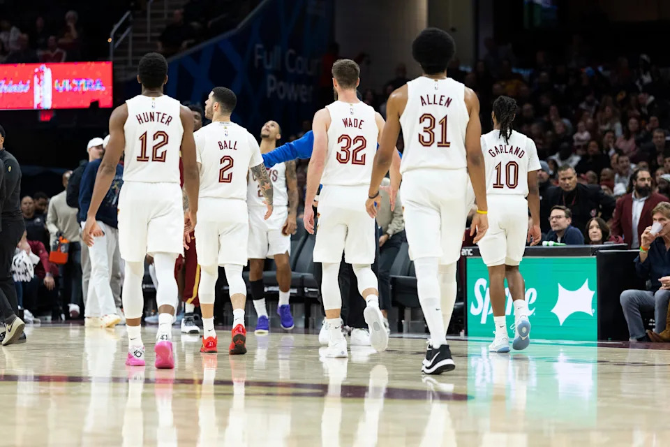 Dec 19, 2025; Cleveland, Ohio, USA; The Cleveland Cavaliers walk back to the bench for a timeout during the fourth against the Chicago Bulls quarter at Rocket Arena. Mandatory Credit: Scott Galvin-Imagn Images
