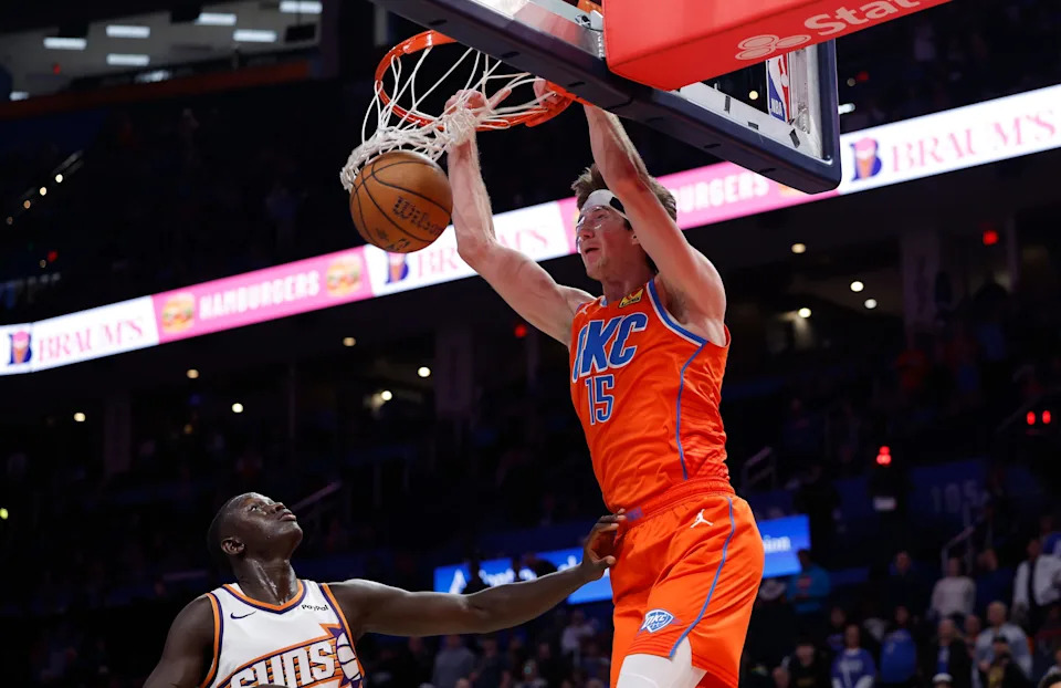 Dec 10, 2025; Oklahoma City, Oklahoma, USA; Oklahoma City Thunder center Branden Carlson (15) dunks against the Phoenix Suns during the second half at Paycom Center. Mandatory Credit: Alonzo Adams-Imagn Images