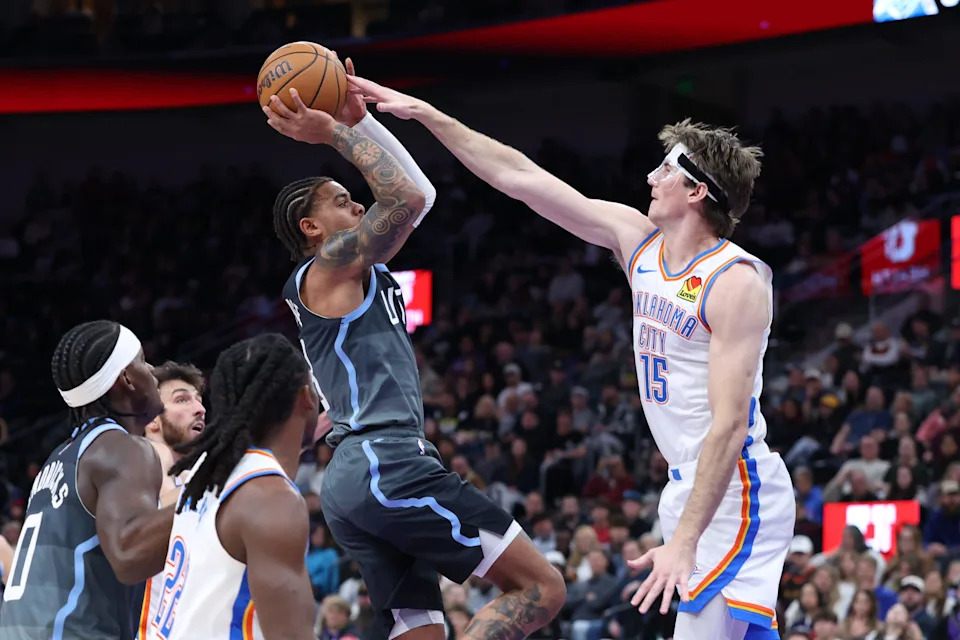 Dec 7, 2025; Salt Lake City, Utah, USA; Utah Jazz guard Keyonte George (3) looks to shoot against Oklahoma City Thunder center Branden Carlson (15) during the second half at Delta Center. Mandatory Credit: Rob Gray-Imagn Images