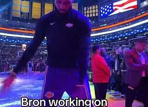 LeBron James has come under fire for seemingly practicing his golf swing during the national anthem