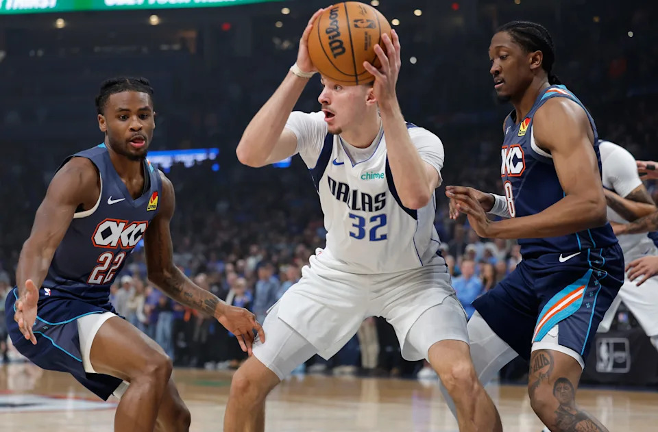 Dec 5, 2025; Oklahoma City, Oklahoma, USA; Oklahoma City Thunder guard Cason Wallace (22) and guard Jalen Williams (8) defend Dallas Mavericks forward Cooper Flagg (32) as he looks to pass during the first quarter at Paycom Center. Mandatory Credit: Alonzo Adams-Imagn Images