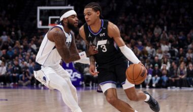 Utah Jazz guard Keyonte George (3) drives past Dallas Mavericks guard Jaden Hardy...