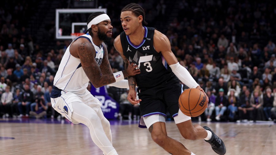 Utah Jazz guard Keyonte George (3) drives past Dallas Mavericks guard Jaden Hardy...