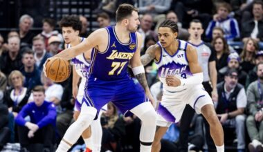 Los Angeles Lakers guard Luka Dončić (77) backs down Utah Jazz guard Keyonte George (3)...