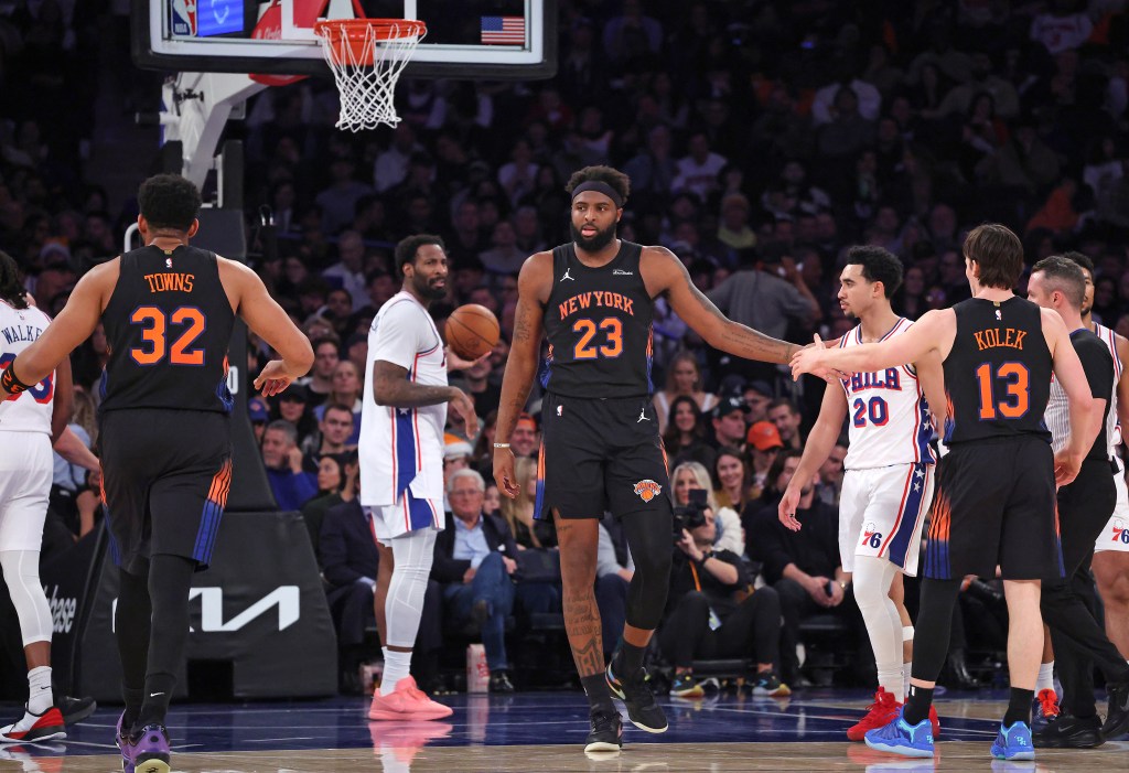 New York Knicks center Mitchell Robinson #23 is greeted by New York Knicks guard Tyler Kolek #13 after being fouled during the second quarter.
