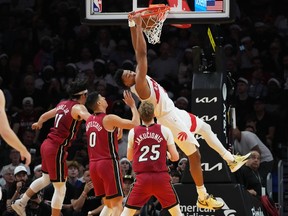 Toronto Raptors forward Scottie Barnes dunks the ball against the Miami Heat.