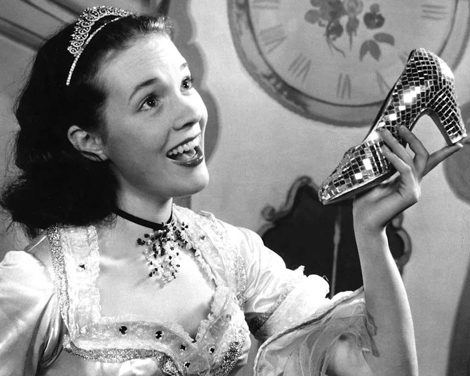 Julie Andrews poses with a glass slipper in the role of Cinderella, circa 1957. (Silver Screen Collection/Archive Photos/Getty Images)
