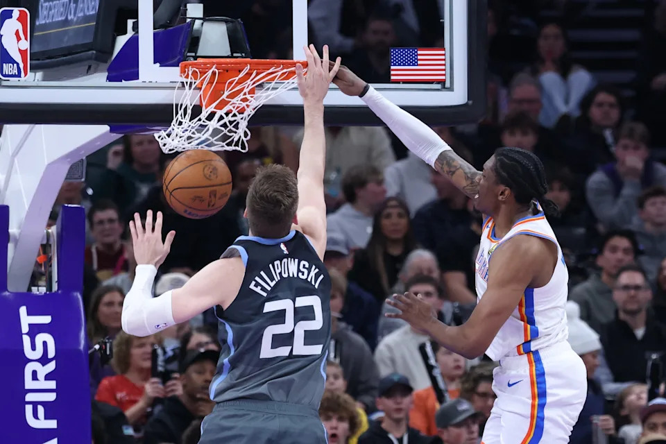 Dec 7, 2025; Salt Lake City, Utah, USA; Oklahoma City Thunder guard Jalen Williams (8) dunks the ball against Utah Jazz forward Kyle Filipowski (22) during the second half at Delta Center. Mandatory Credit: Rob Gray-Imagn Images