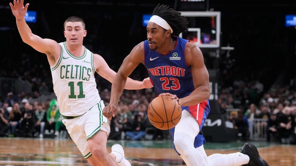 Detroit Pistons guard Jaden Ivey (23) drives to the basket against Boston Celtics guard Payton Pritchard (11) during the first half of an NBA basketball game, Monday, Dec. 15, 2025, in Boston. (AP Photo/Charles Krupa)