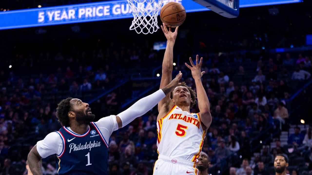 Johnson hits late 3s for Hawks to spoil Embiid's 76ers return in 142-134 double-OT win