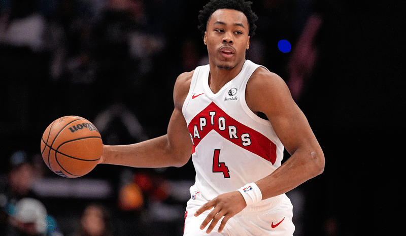 Toronto Raptors forward Scottie Barnes (4) brings the ball up court against the Charlotte Hornets during the second half at Spectrum Center.