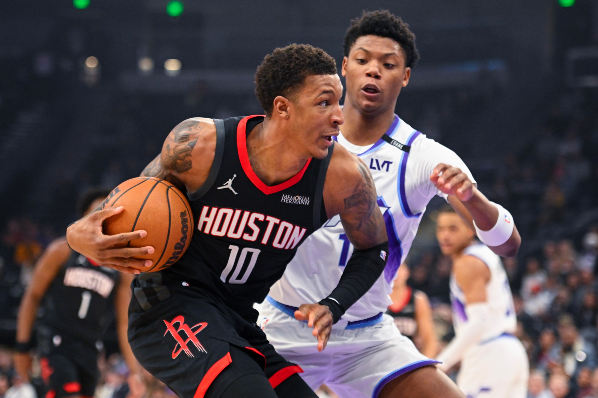 SALT LAKE CITY, UTAH - NOVEMBER 30: Jabari Smith Jr. #10 of the Houston Rockets handles the ball as Ace Bailey #19 of the Utah Jazz defends the play during the first half of the game at Delta Center on November 30, 2025 in Salt Lake City, Utah. NOTE TO USER: User expressly acknowledges and agrees that, by downloading and or using this photograph, User is consenting to the terms and conditions of the Getty Images License Agreement. (Photo by Alex Goodlett/Getty Images)