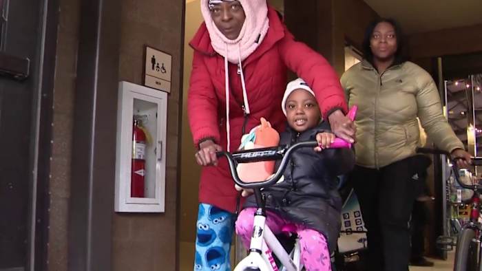 Pistons Owner Tom Gores helps bring holiday joy to thousands of Detroit kids