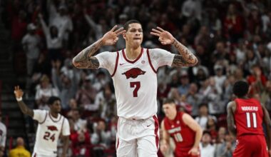 Brazile scores 21 points as No. 25 Arkansas hands No. 6 Louisville its 1st loss, 89-80